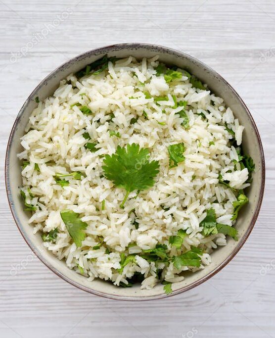 Homemade Cilantro Lime Rice in a Bowl, top view. Flat lay, overhead, from above.