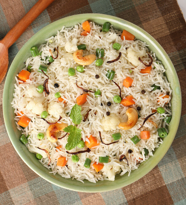 Indian veg biryani, veg pulav, Indian vegetable pulav, Biriyani, vegetable Biriyani served in a ceramic bowl